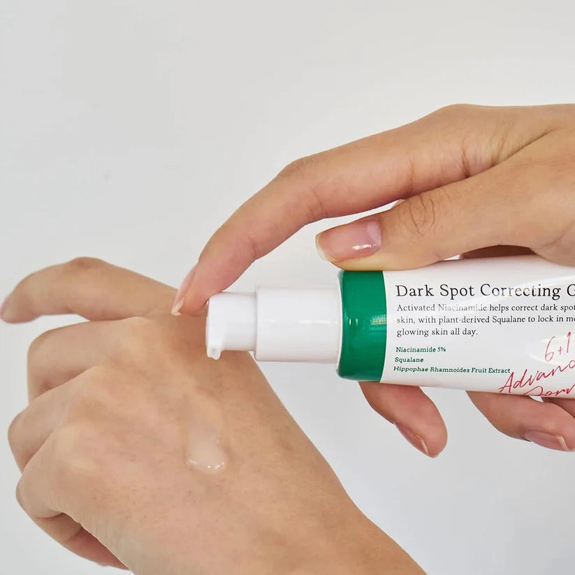 Axis-Y Dark Spot Correcting Glow Serum packaging with dark spot treatment and radiance details