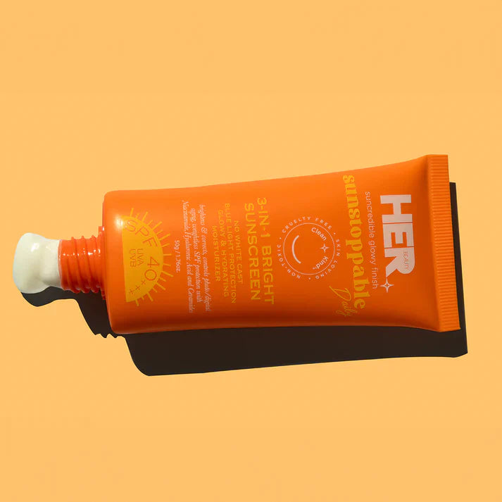 HerBeauty 3 in 1 Bright Sunscreen packaging showing triple action brightening benefits