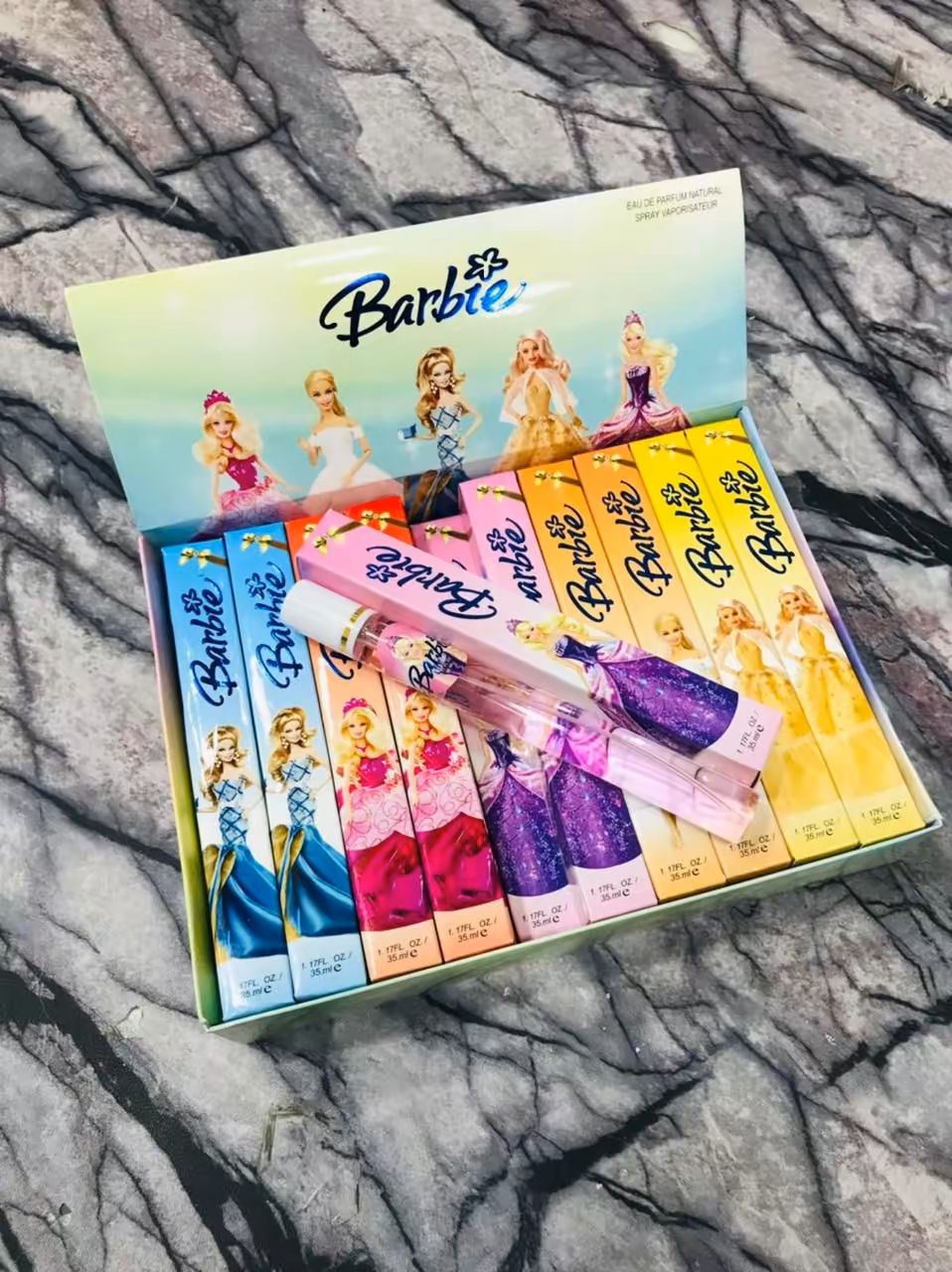 Barbie Pen Pocket Perfume product display with variety of sweet floral scents