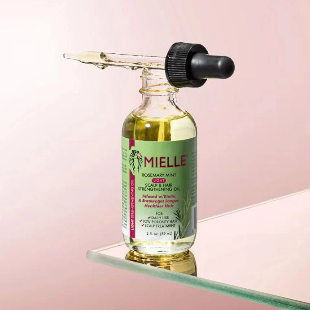 Mielle Rosemary Mint Scalp & Hair Strengthening Oil packaging with biotin and essential oils for strong hair